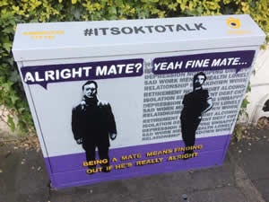Painted electrical box with the Alright Mate messge on it